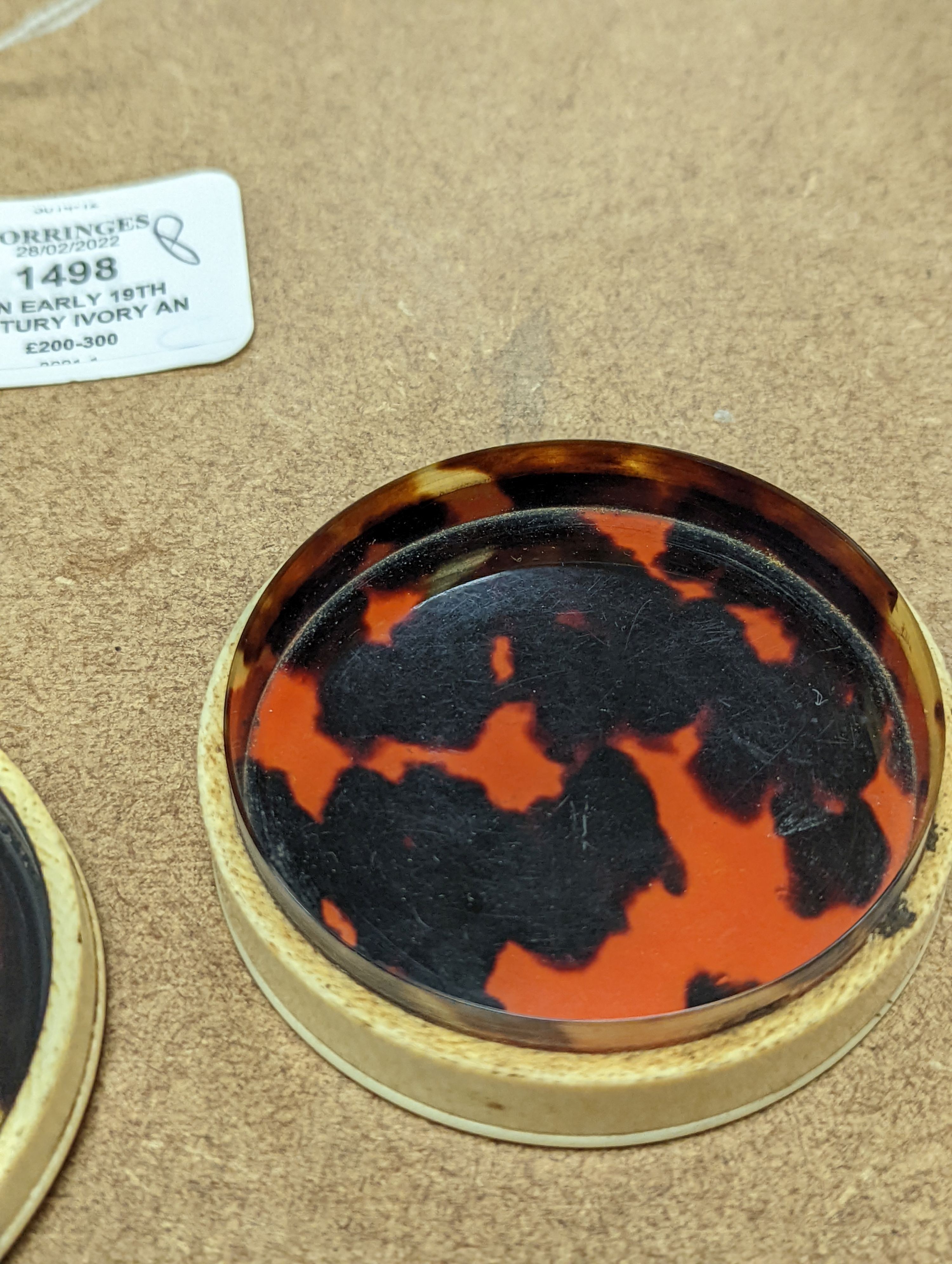 An early 19th century ivory and tortoishell box with inset miniature of Themis to cover, 8cm.